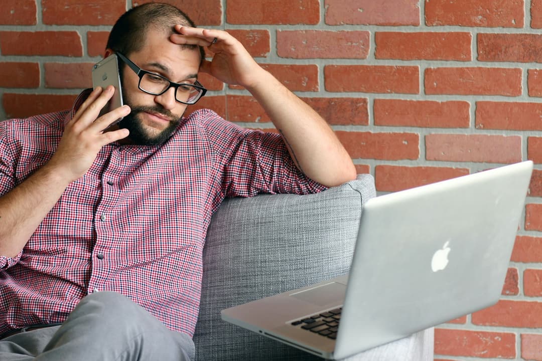 Frustrated business owner switching website hosting providers